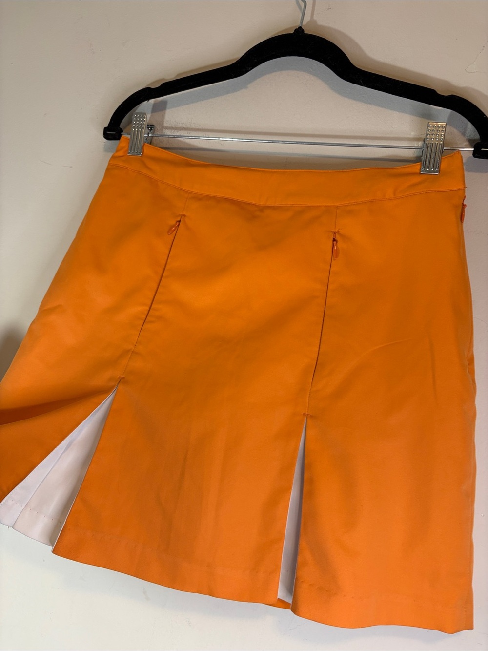 Greg Norman "Perfect Fit" Collection Clementine Orange Pleated Golf Skort